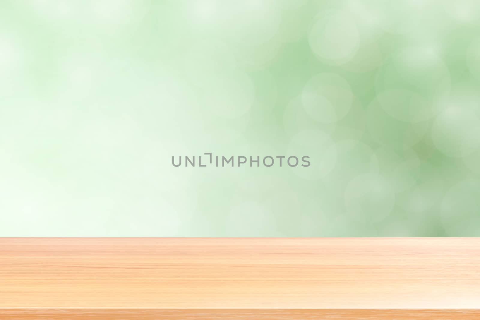 empty wood table floors on blurred bokeh soft green gradient background, wooden plank empty on green bokeh colorful light shade, colorful bokeh lights gradient soft for banner advertising products