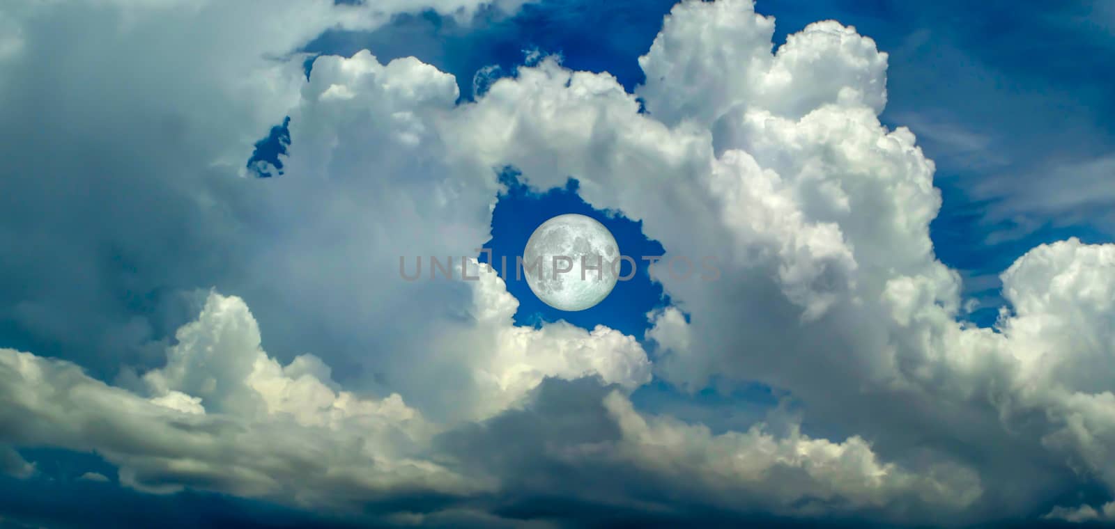 super moon in the hole of donut cloud sky and heaven sunshine a day and blue sky background, Elements of this image furnished by NASA