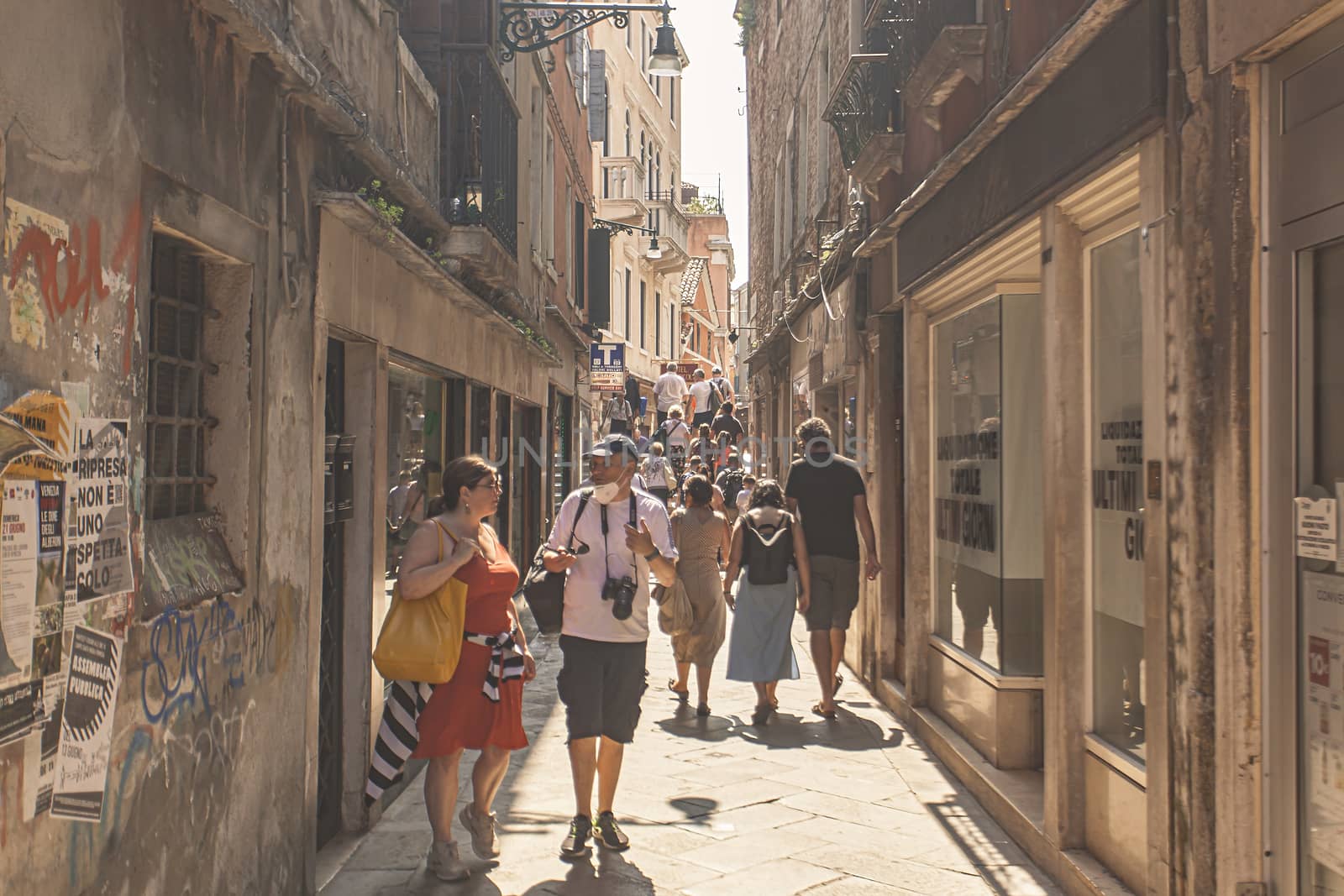 Tourists walk in Venice street 6 by pippocarlot