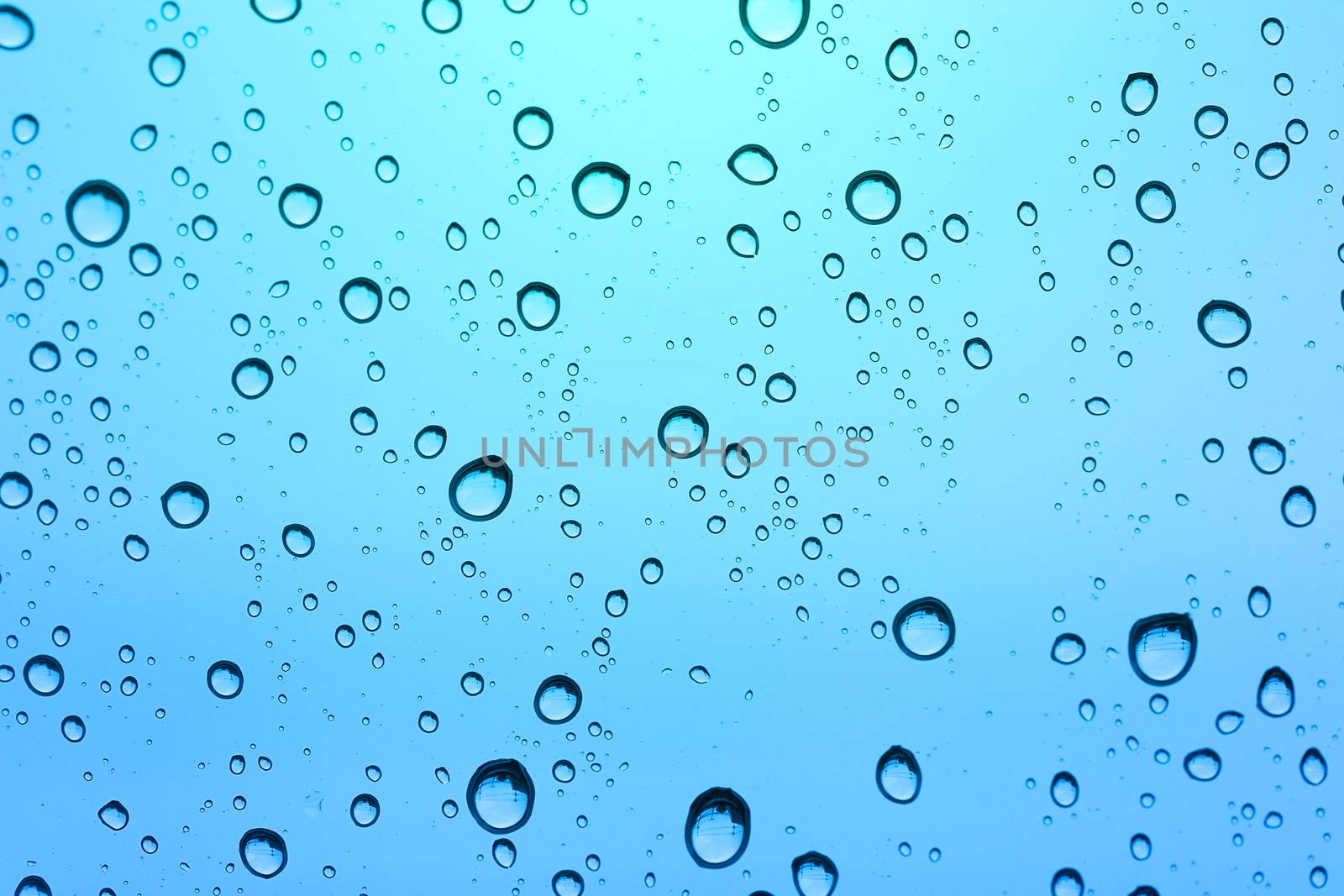 Blue water drop background. by jayzynism