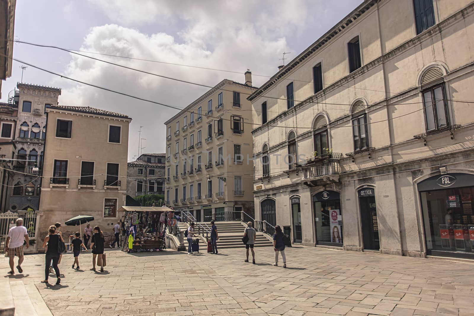 VENICE, ITALY 2 JULY 2020: Tourists walk in Venice street