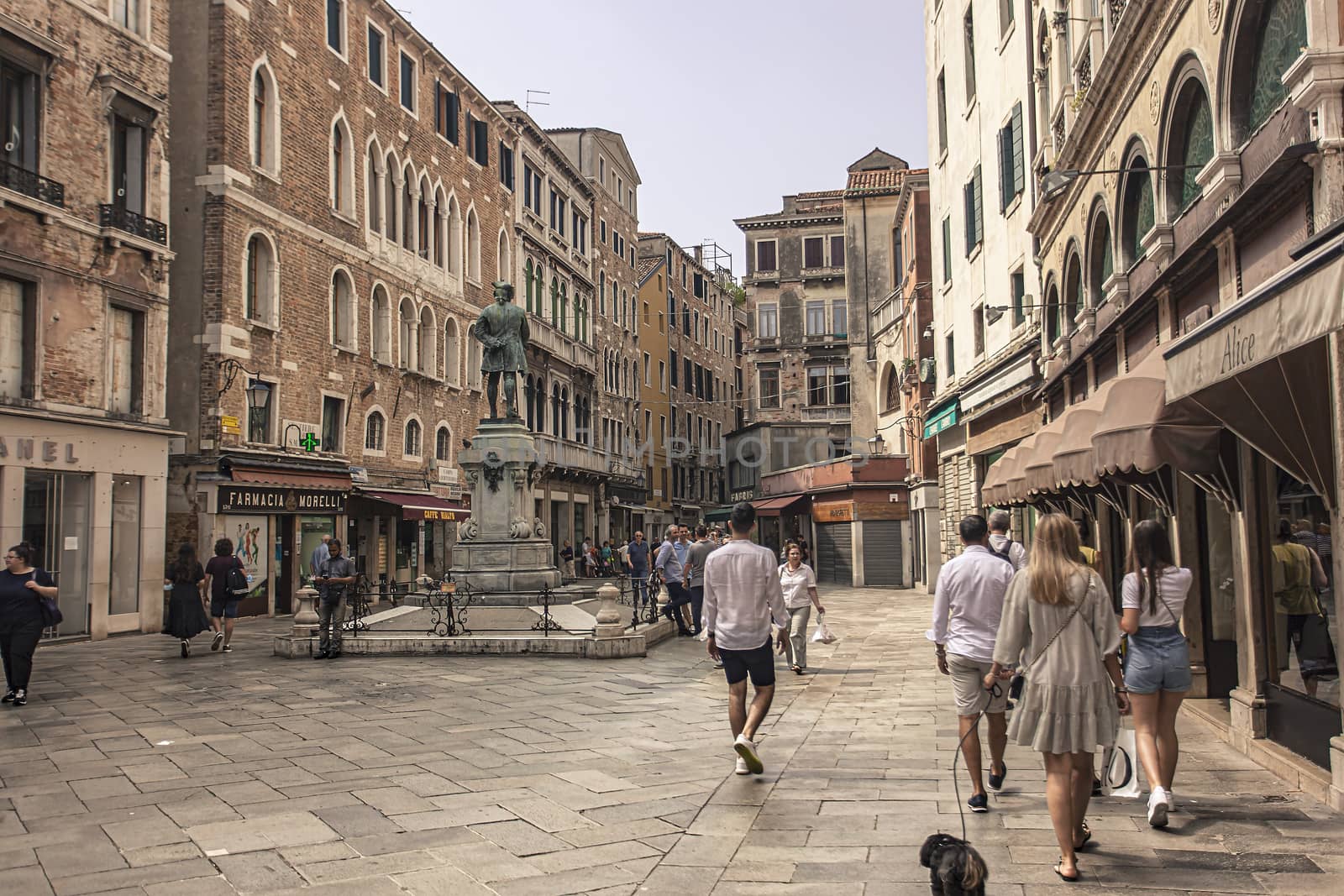 Tourists walk in Venice street 9 by pippocarlot
