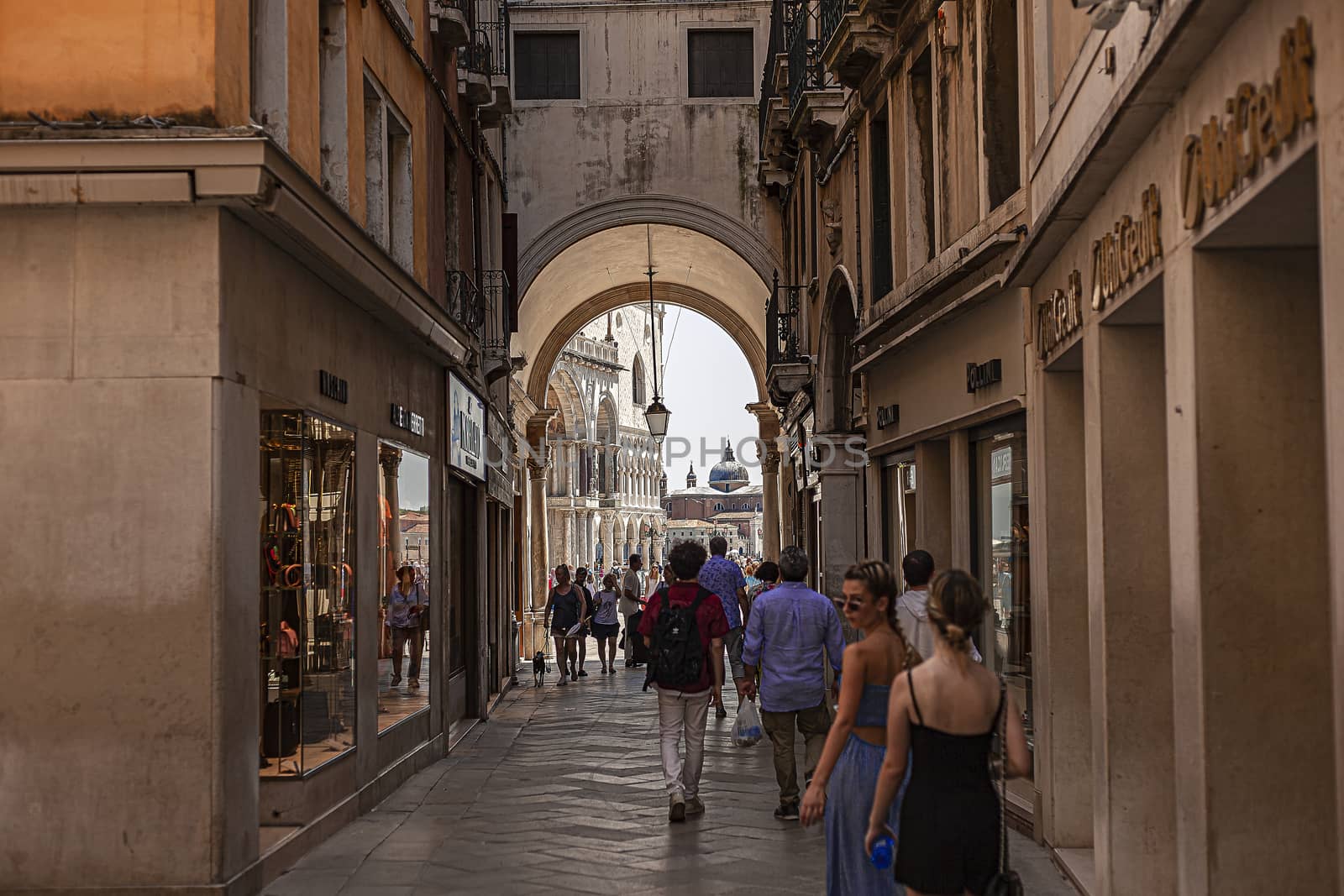 Tourists walk in Venice street 10 by pippocarlot