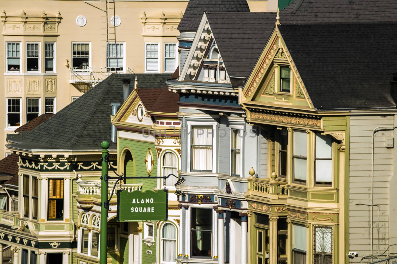 view on Alamo Square sign with detail of facades and exterior Painted Ladies architecture by kb79