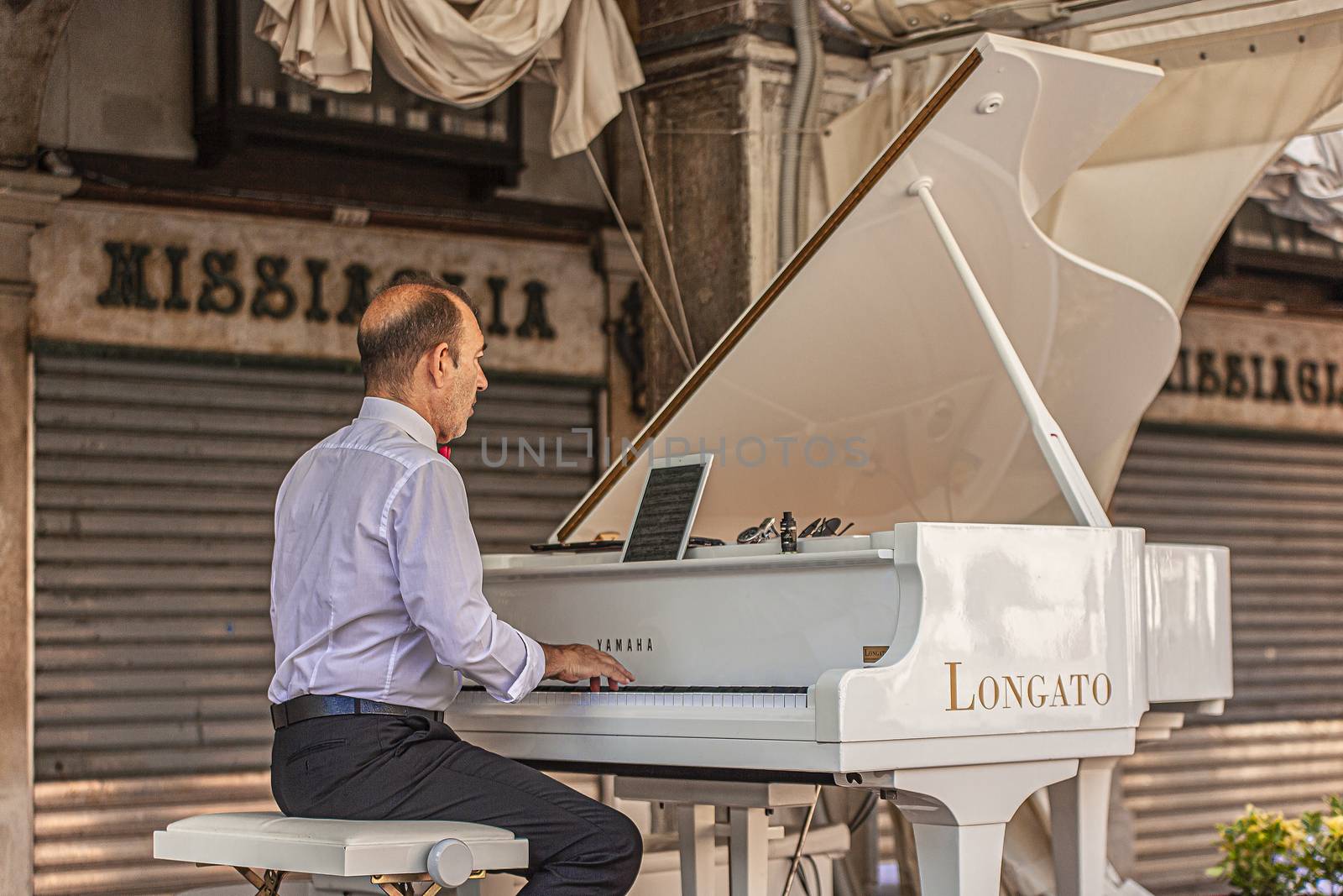 VENICE, ITALY 2 JULY 2020: Musician in Venice