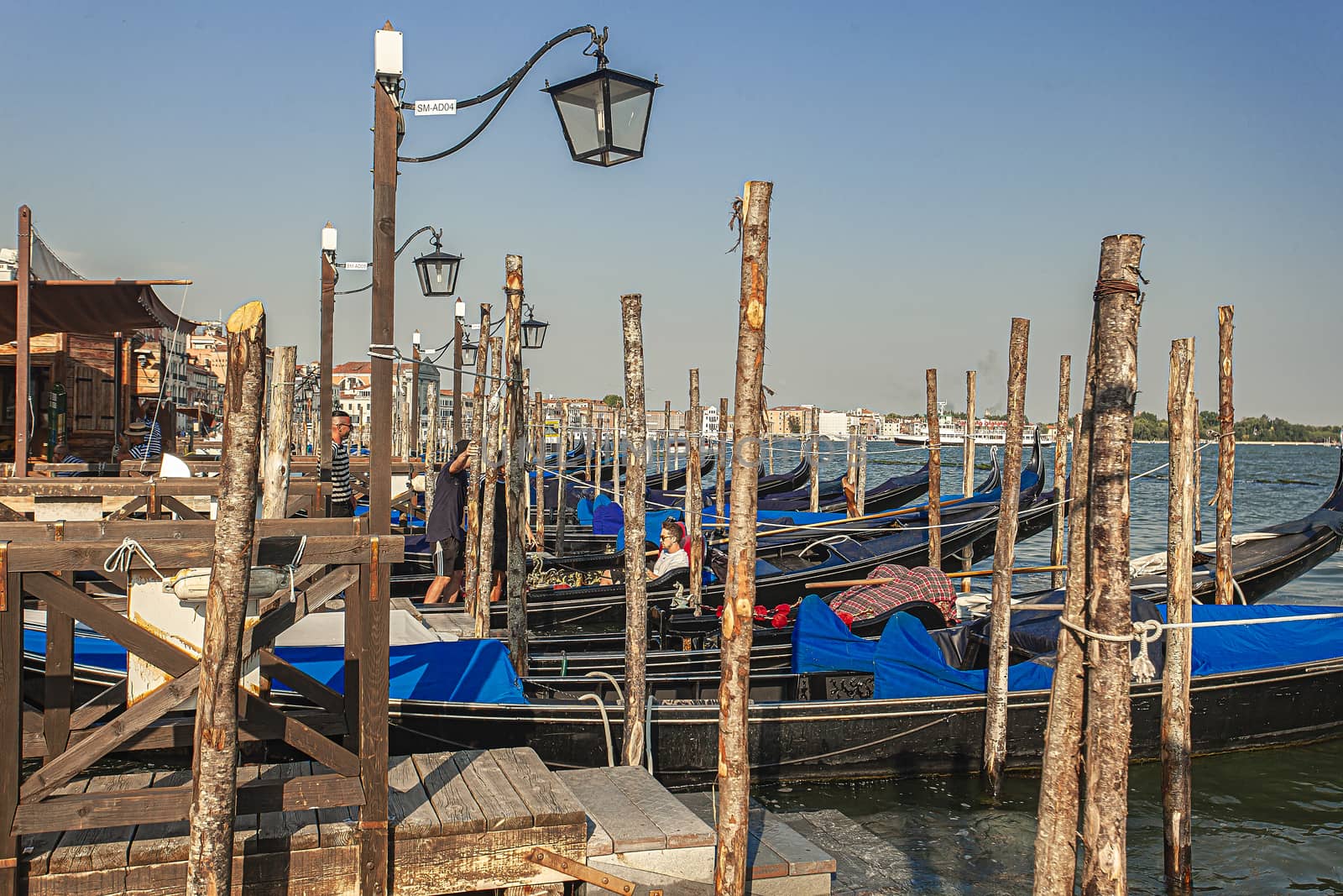 VENICE, ITALY 2 JULY 2020: Gondolas moored in San Marco square in Venice