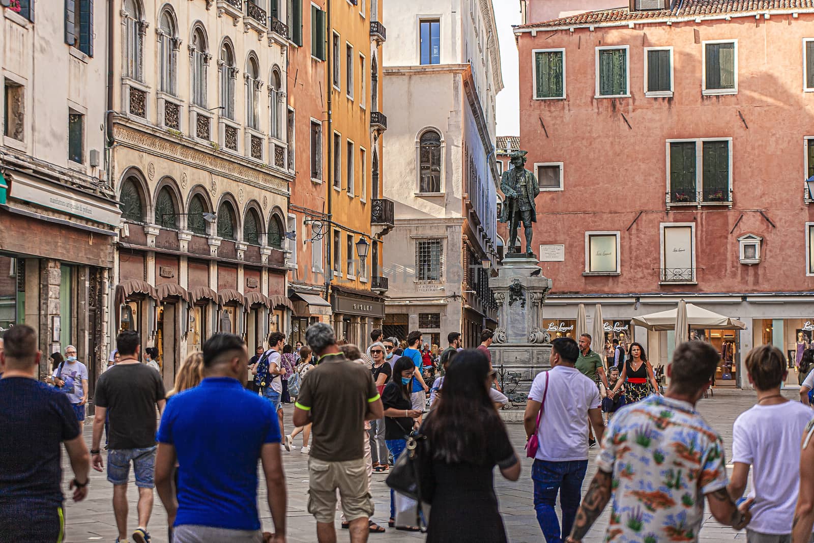 VENICE, ITALY 2 JULY 2020: Tourists walk in Venice street