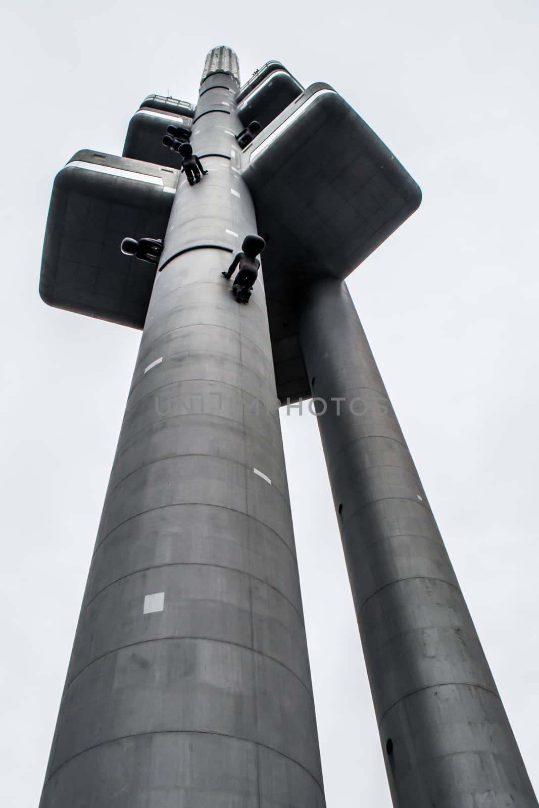 Zizkov TV tower in Prague from low angle point of view. Travel, tourism and architecture by kb79