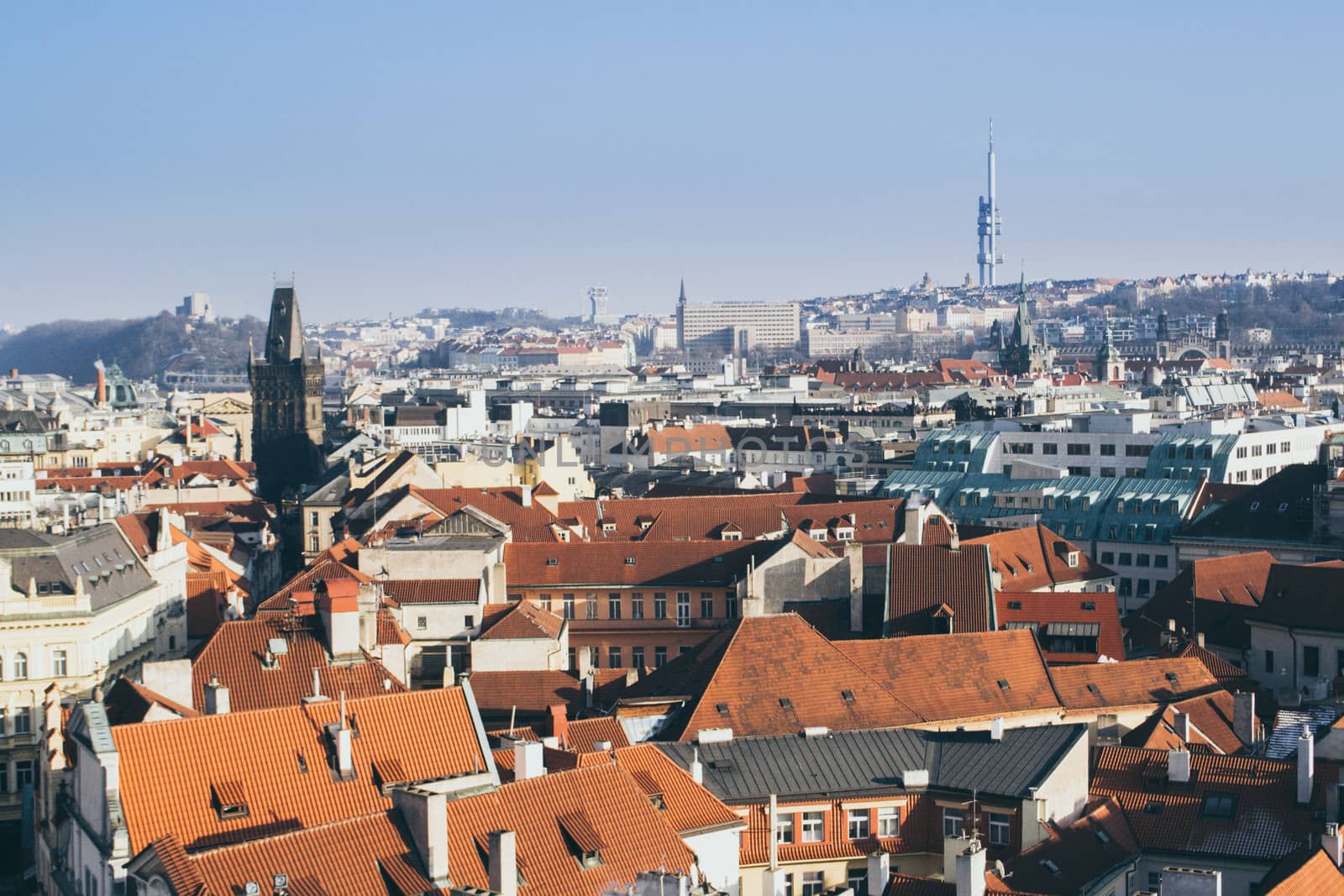 cityscape of Prague on a sunny and cold winter day with blue sky