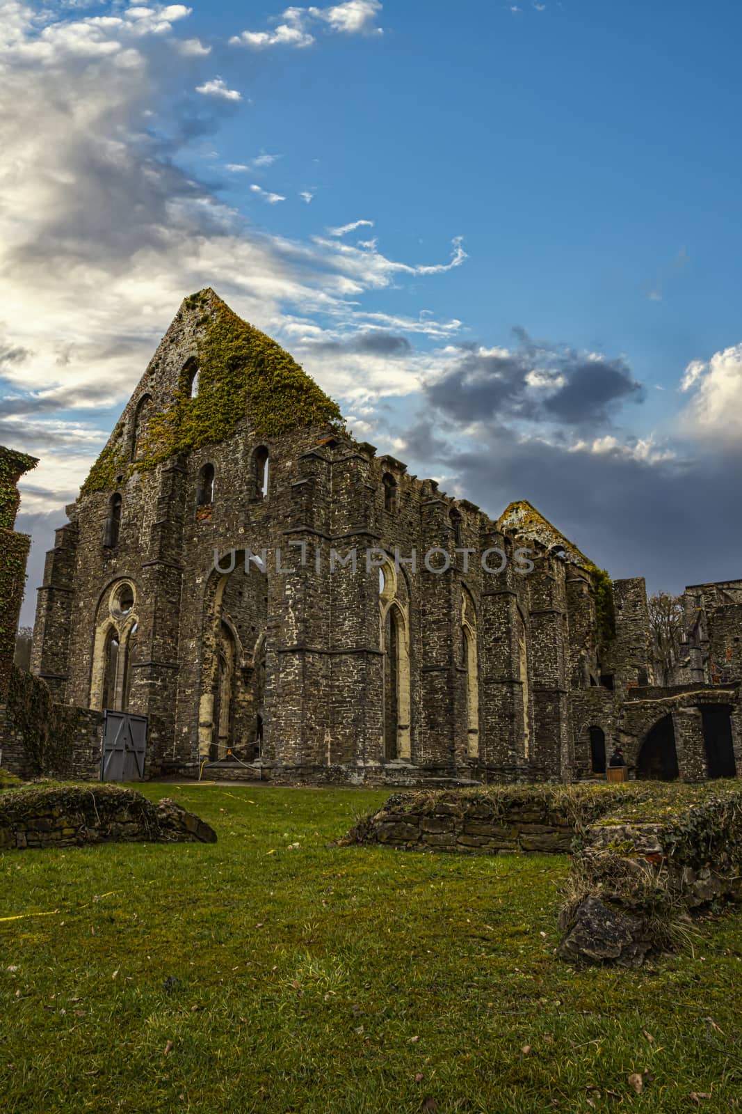 View of an abandoned and broken church at the early sunset ambiance light - High quality photo