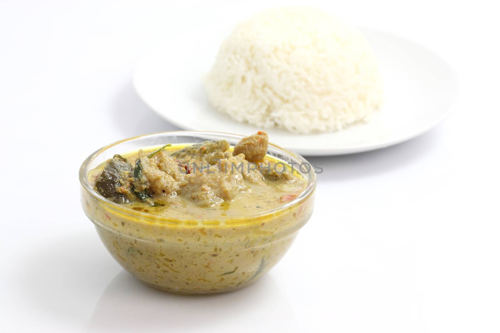 Thai food beef curry with rice isolated in white background by piyato