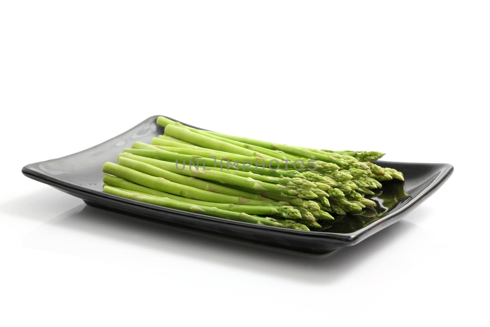 Asparagus isolated in white background by piyato