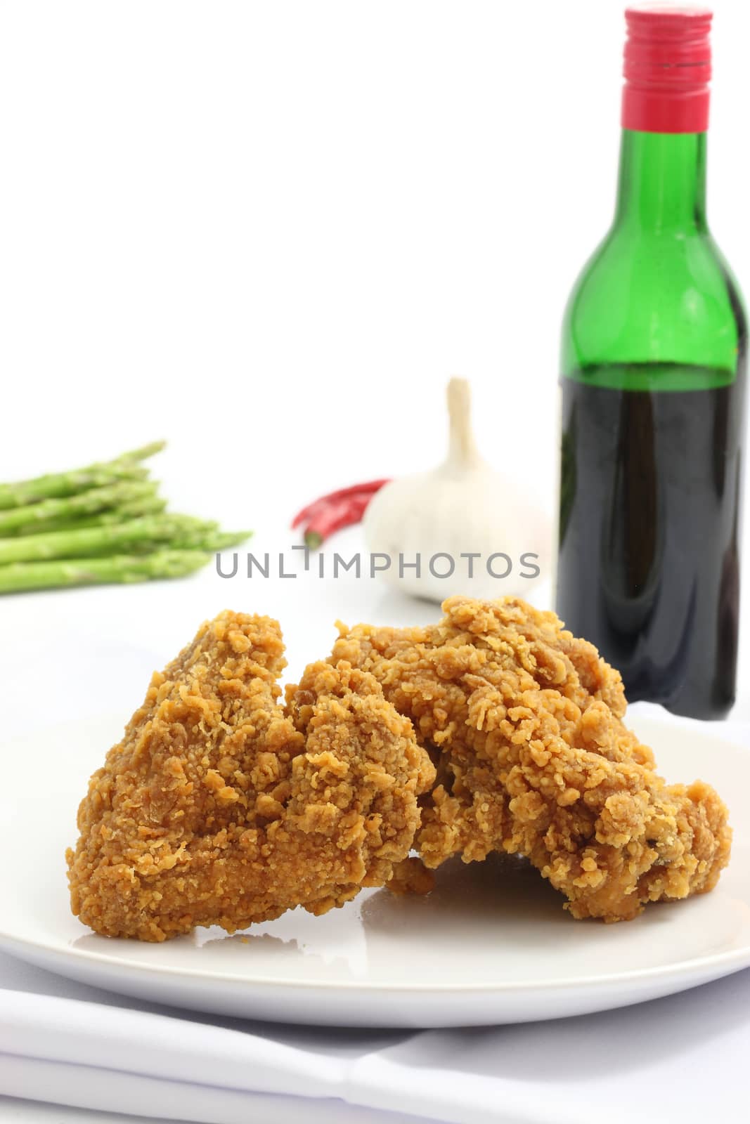 chicken fry isolated in white background by piyato