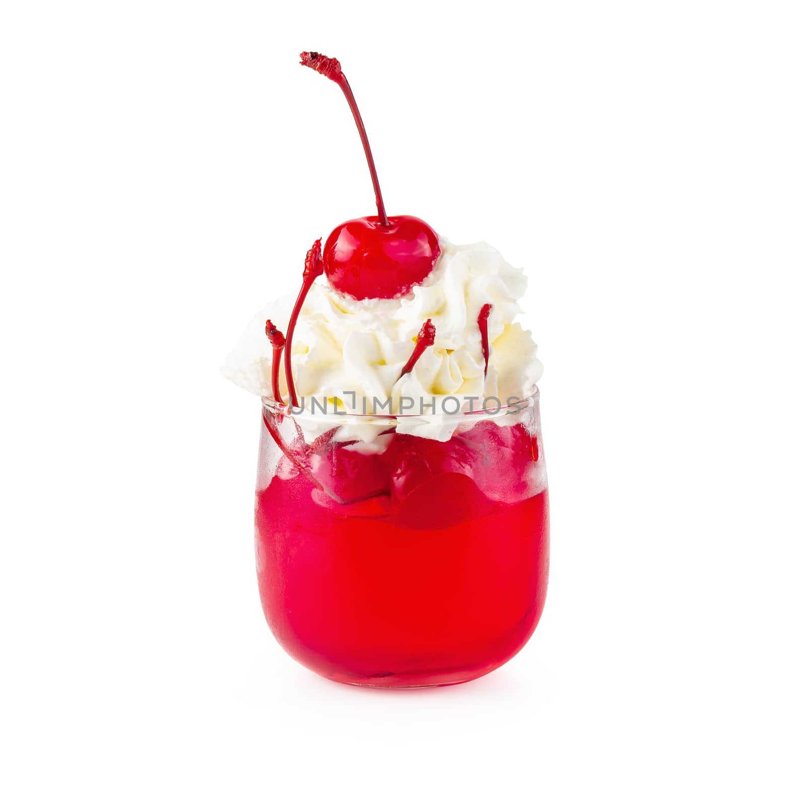Strawberry jelly in a glass with cherries and whipped cream isol by kaiskynet