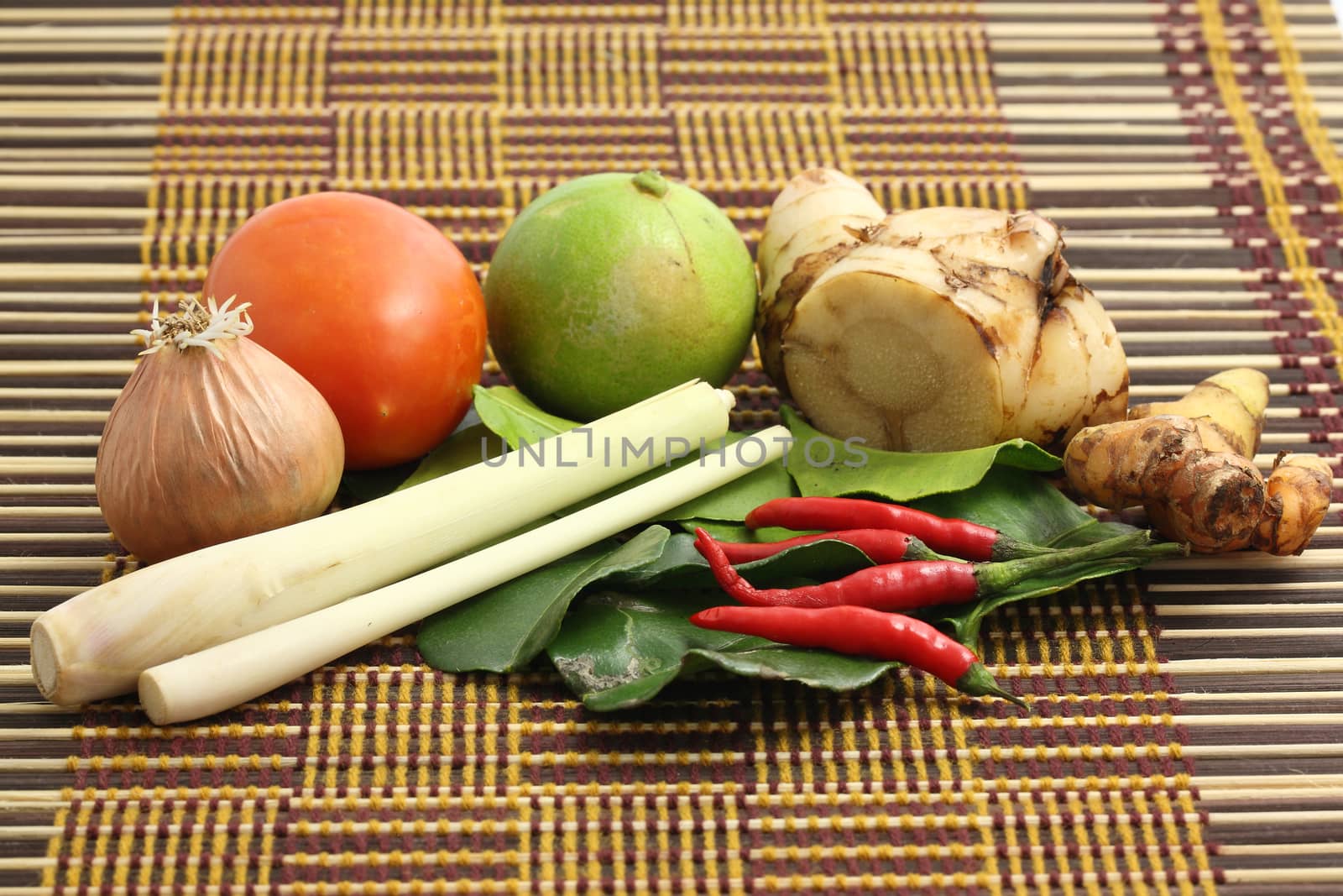 Thai food ingredient for Tom yum kung on wood background by piyato