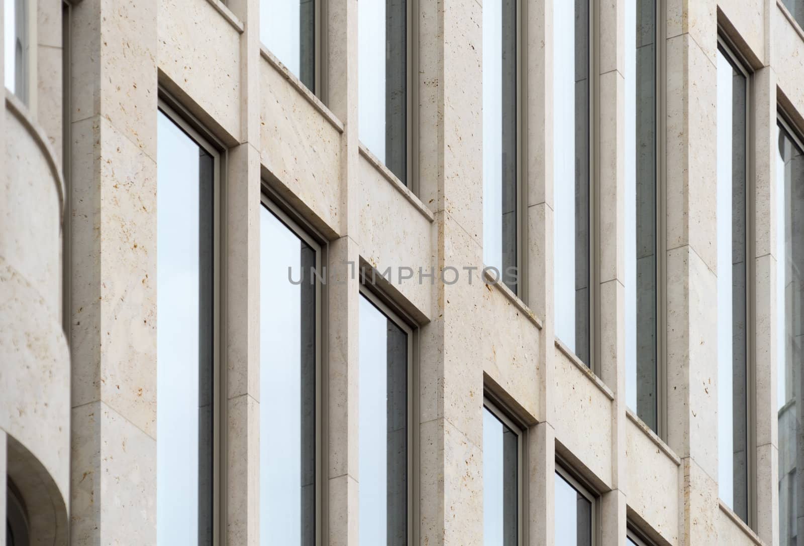 Detailed view of a building with high straight windows, strict geometry by geogif