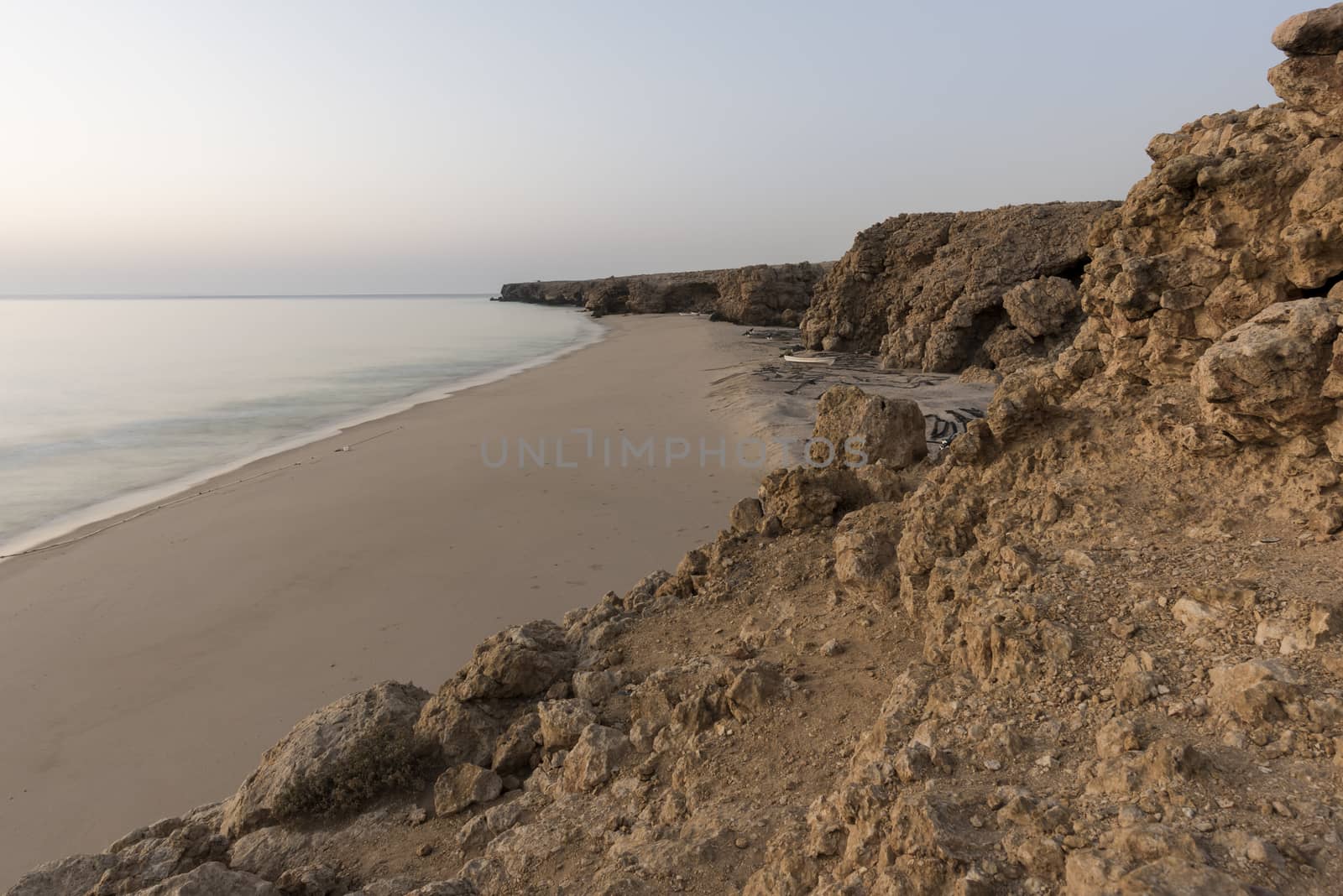 Wild beach at the coat of Ras Al Jinz, Sultanate of Oman. It is a place for fishermen to put their boats and repair their nets.