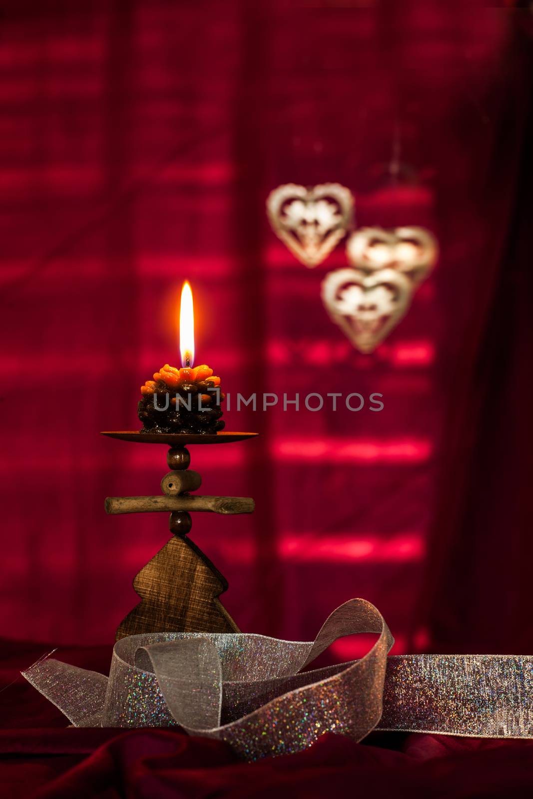 Christmas concept with red background and candles