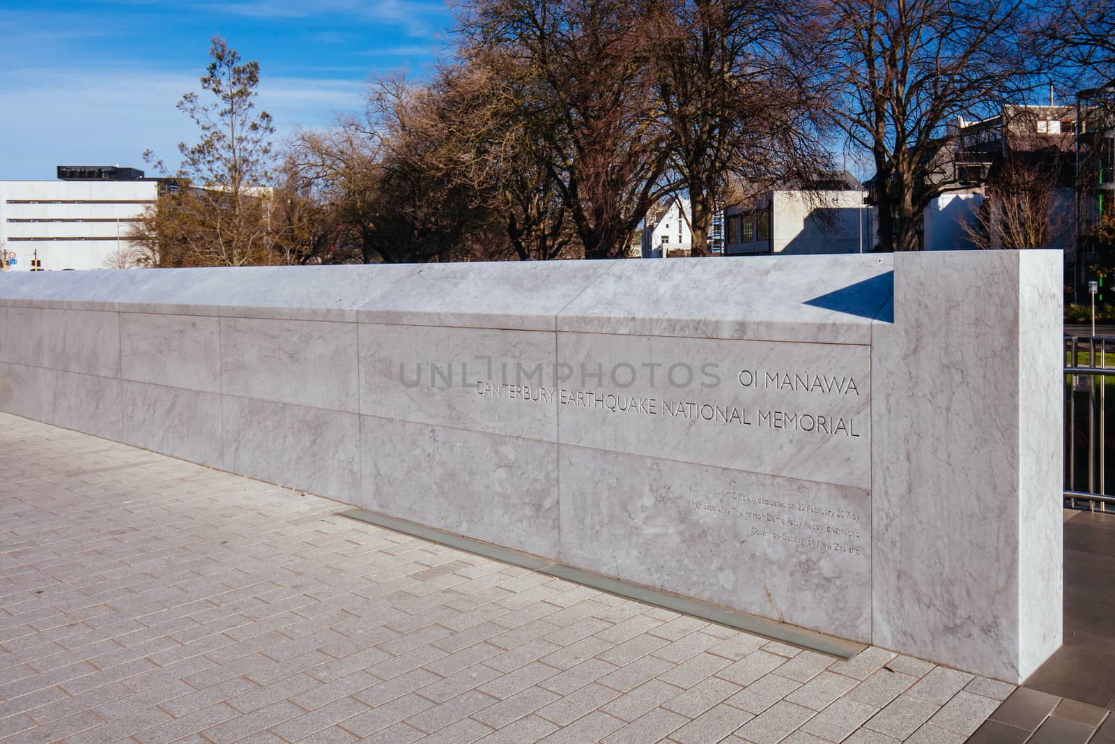 Christchurch, New Zealand - September 18, 2019: Canterbury Earthquake Memorial Wall on the banks of the Avon River with names of 185 lost lives