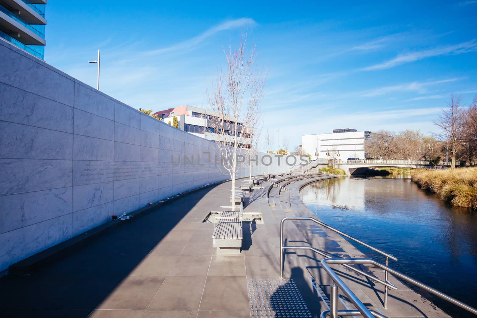 Christchurch, New Zealand - September 18, 2019: Canterbury Earthquake Memorial Wall on the banks of the Avon River with names of 185 lost lives