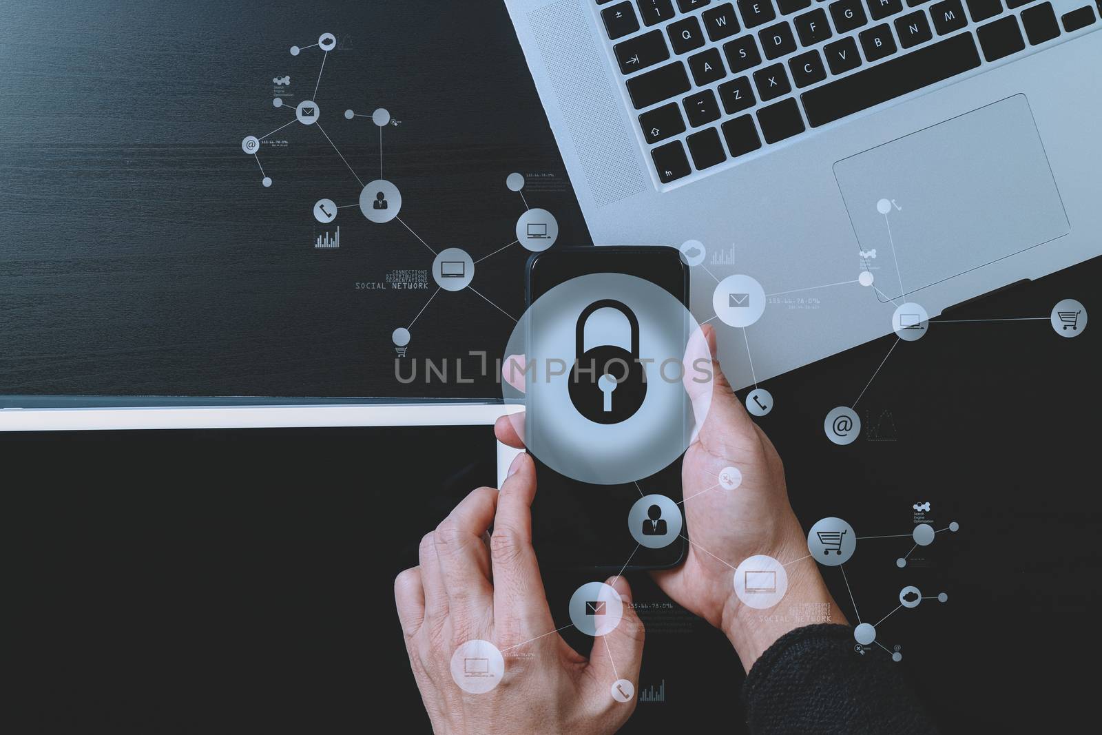 cyber security internet and networking concept.Businessman hand working with VR screen padlock icon on mobile phone and digital tablet laptop computer