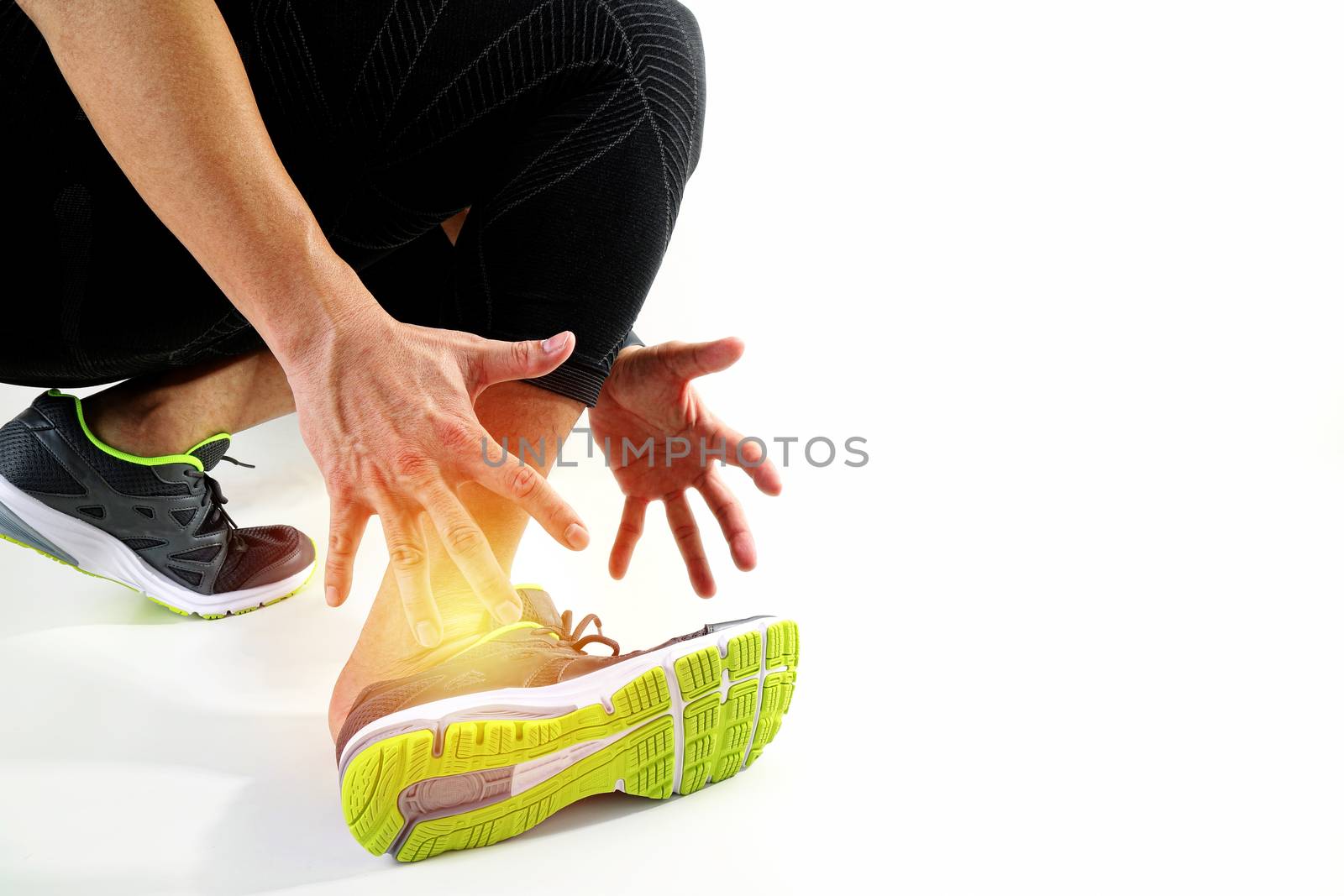 Runner sportsman holding ankle in pain with Broken twisted joint running sport injury and Athletic man touching foot due to sprain on white background