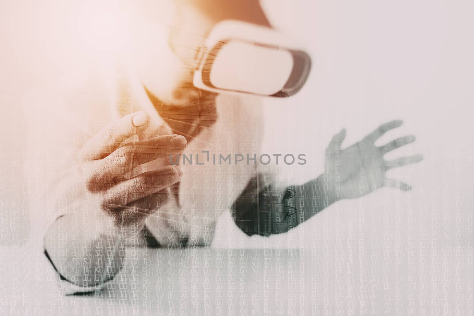 businessman wearing virtual reality goggles in modern office with mobile phone using with VR headset with building and metrix code exposure