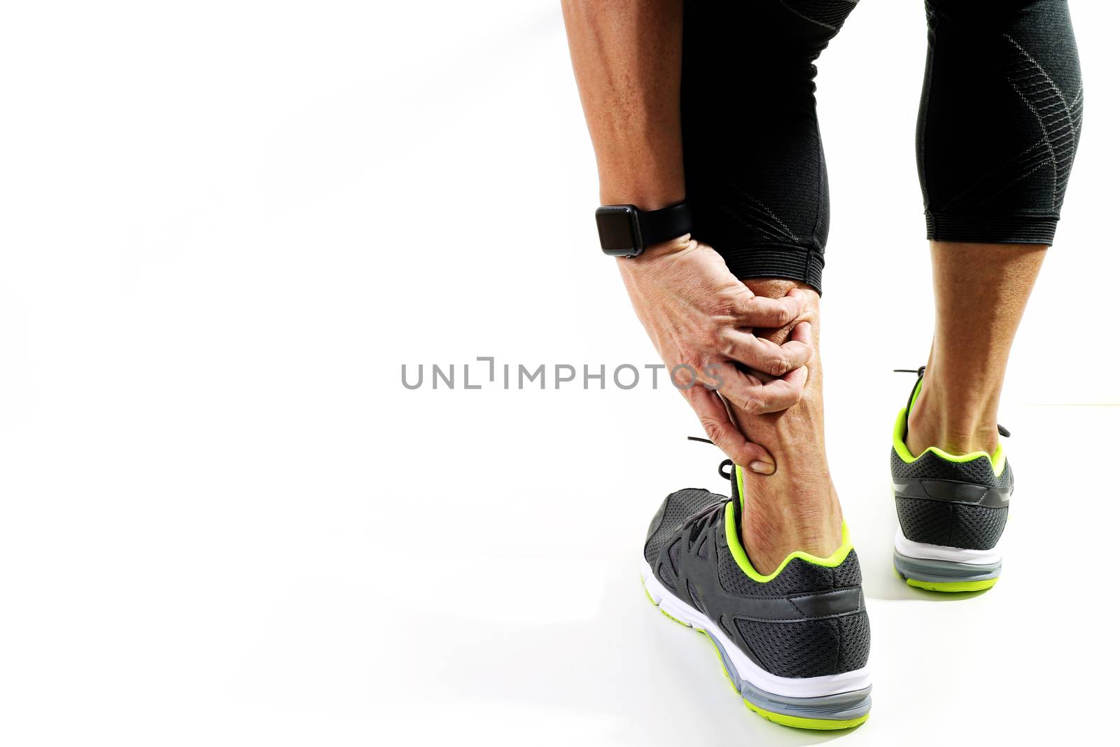 Runner sportsman holding ankle in pain with Broken twisted joint running sport injury and Athletic man touching foot due to sprain on white background