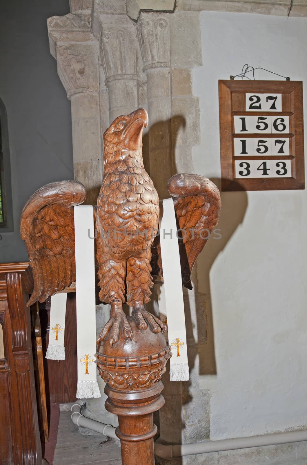 Wooden religious icon carved in the shape of an eagle in a small church