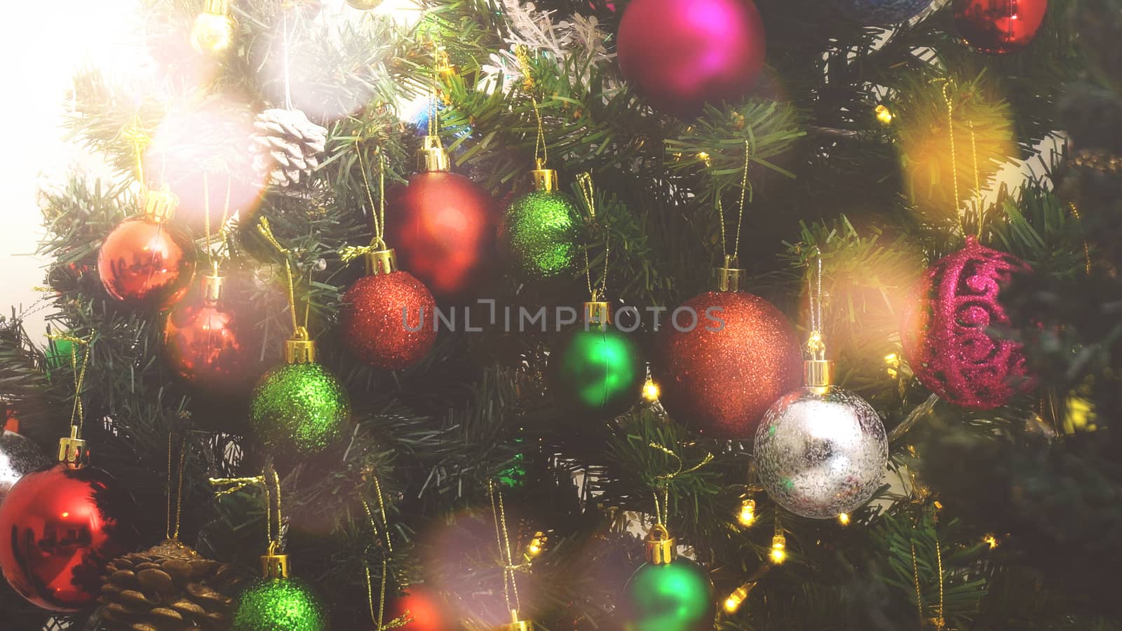 Greeting Season concept.close up of ornaments on a Christmas tre by everythingpossible