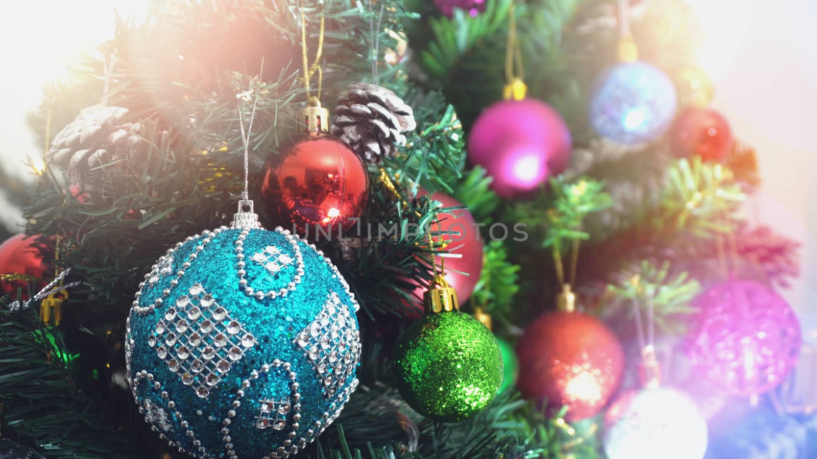 Greeting Season concept.close up of ornaments on a Christmas tre by everythingpossible