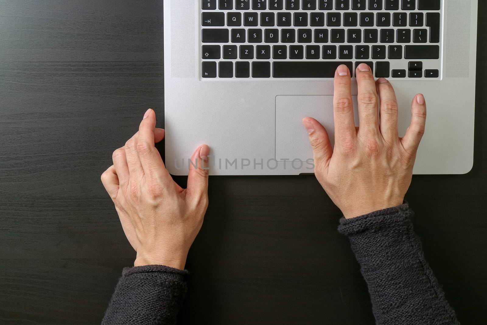 cyber security internet and networking concept.Businessman hand working with laptop computer