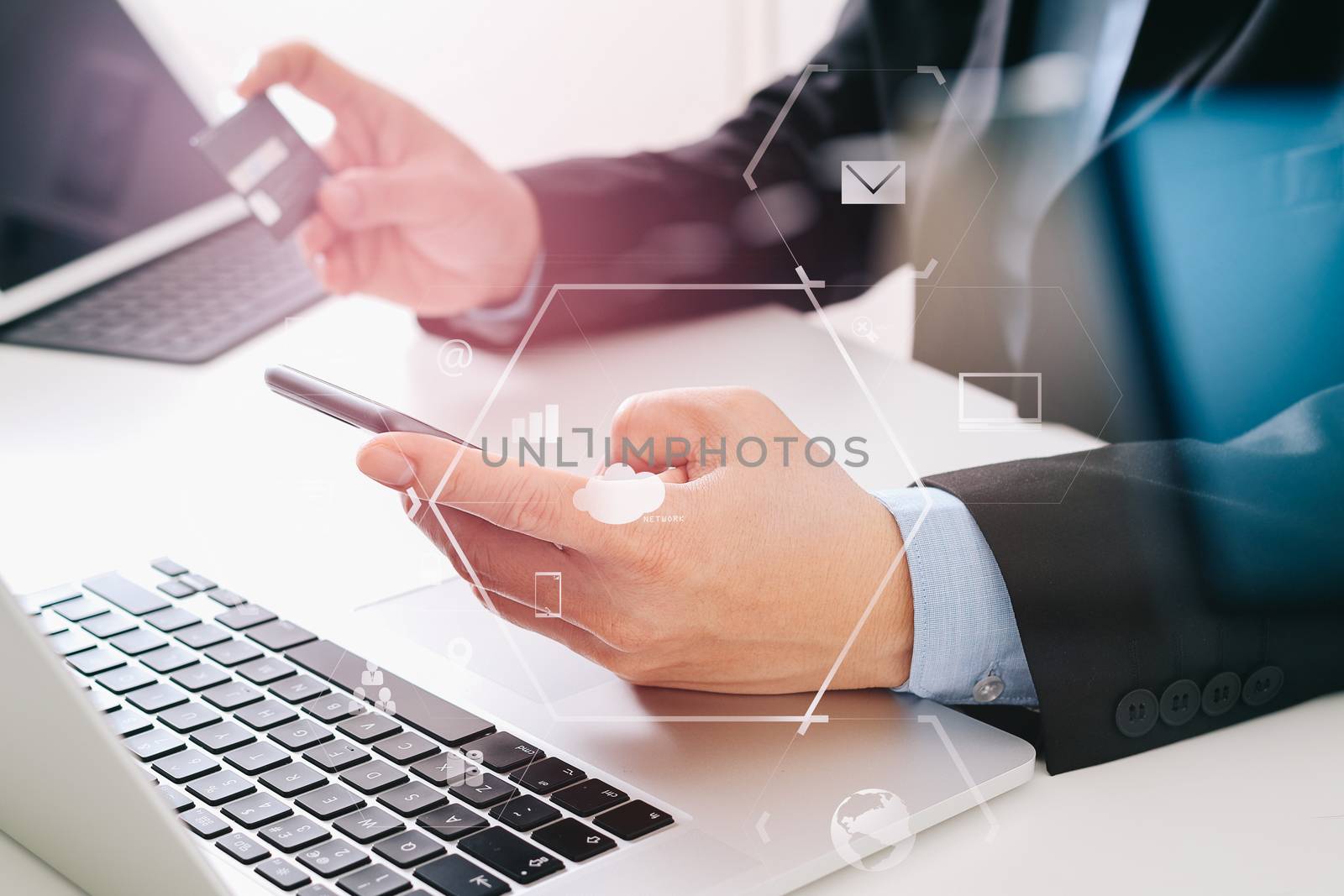 businessman making credit card purchase online with mobile phone by everythingpossible