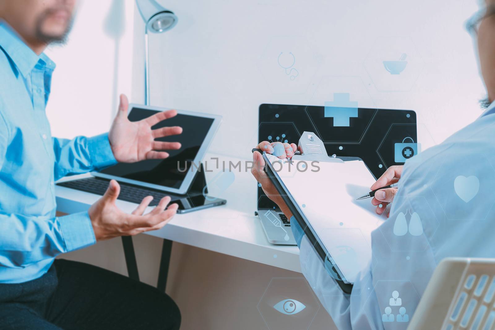 Medical doctor in white uniform gown coat consulting businessman patient having exam as Hospital professionalism concept with VR icon diagram