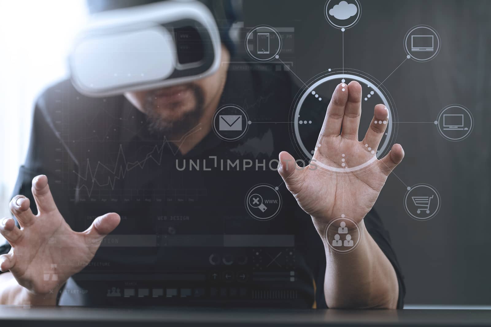 businessman wearing virtual reality goggles in modern office with Smartphone using with VR headset with screen icon diagram