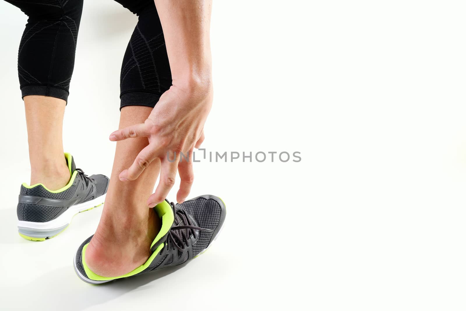 Runner sportsman holding ankle in pain with Broken twisted joint by everythingpossible