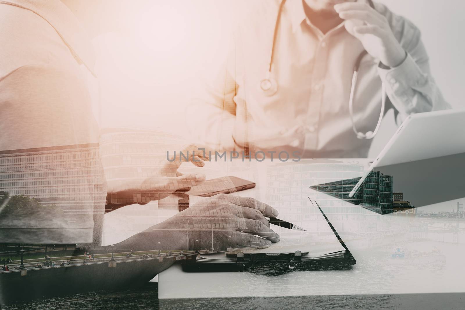 Medical doctor using mobile phone and consulting businessman patient having exam as Hospital professionalism concept with city exposure