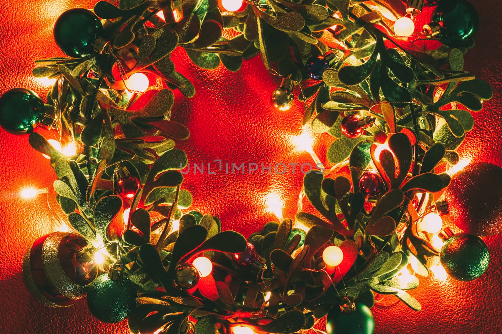 Greeting Season concept.Christmas wreath with decorative light o by everythingpossible