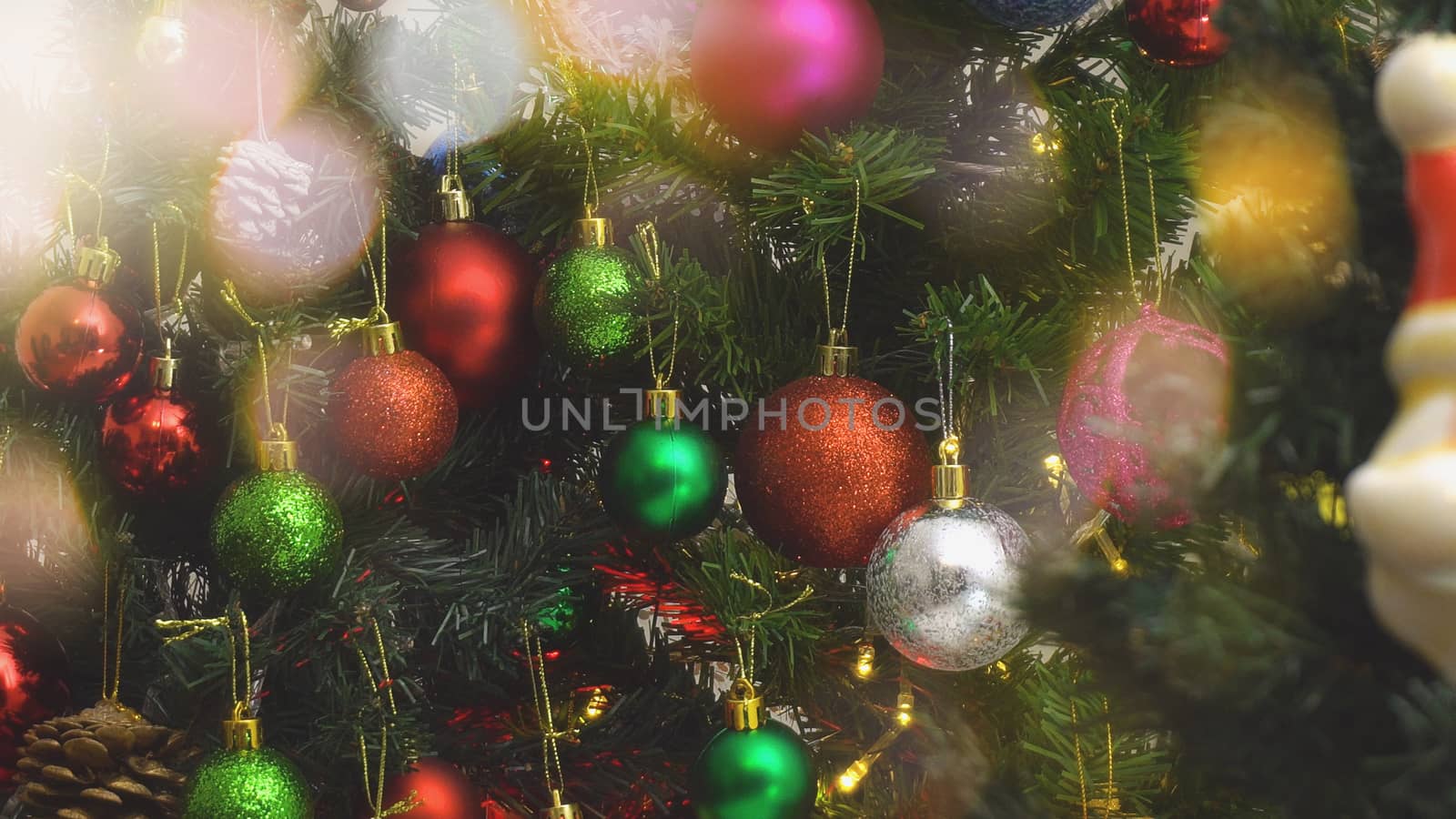 Greeting Season concept.close up of ornaments on a Christmas tre by everythingpossible