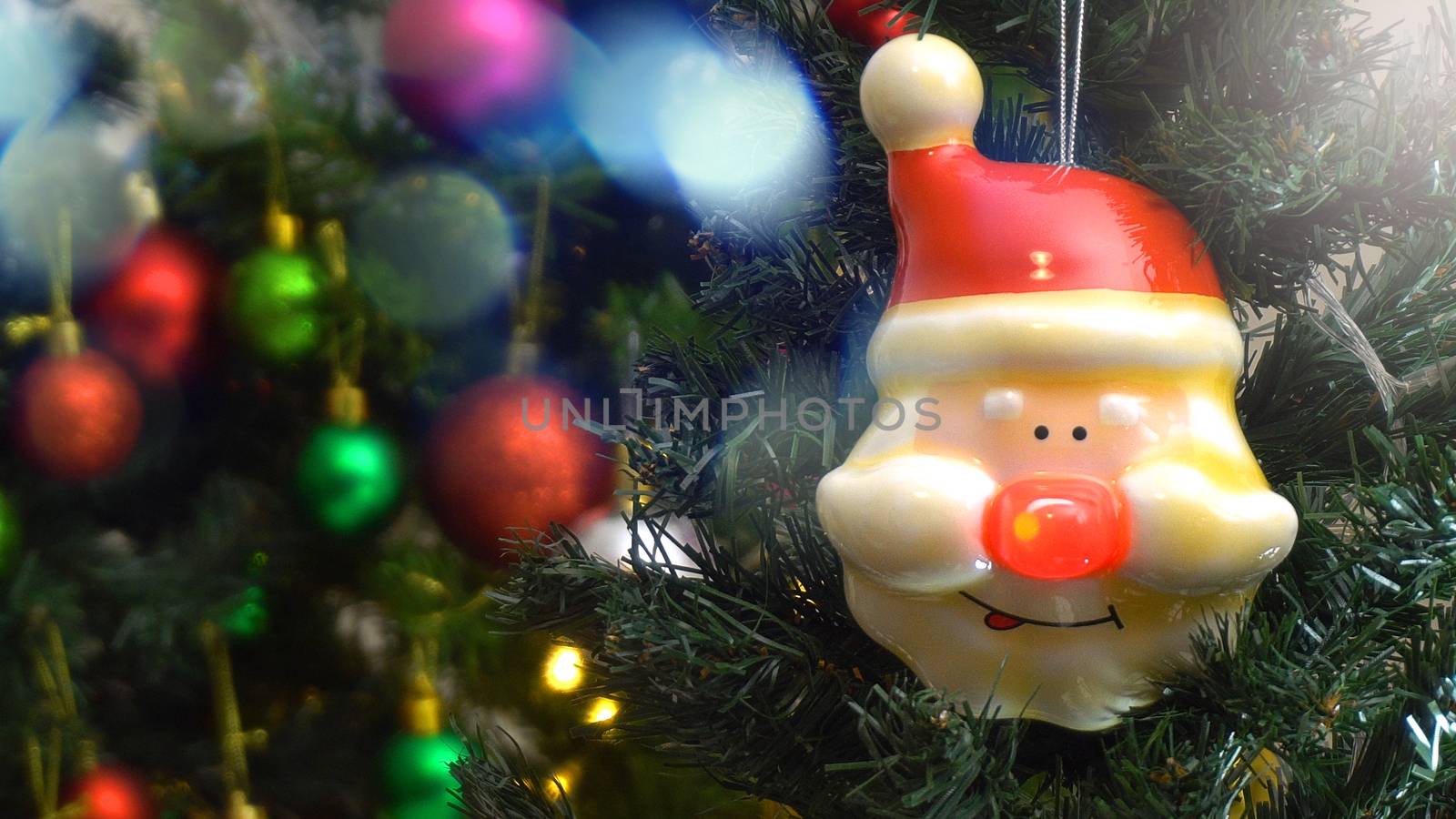 Greeting Season concept.close up of ornaments on a Christmas tre by everythingpossible