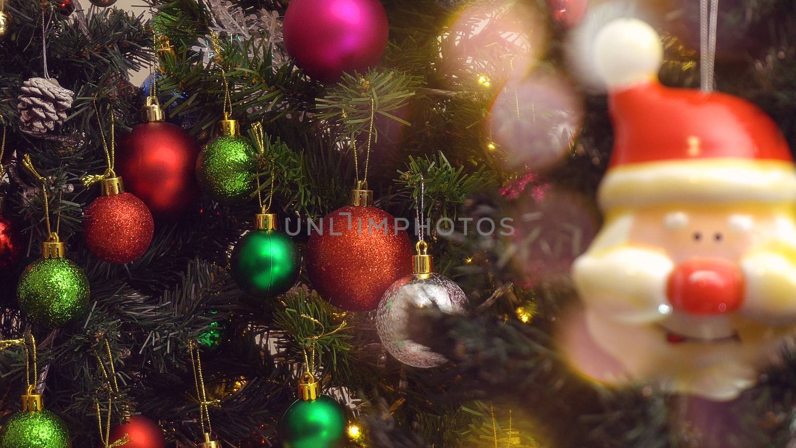 Greeting Season concept.close up of ornaments on a Christmas tre by everythingpossible