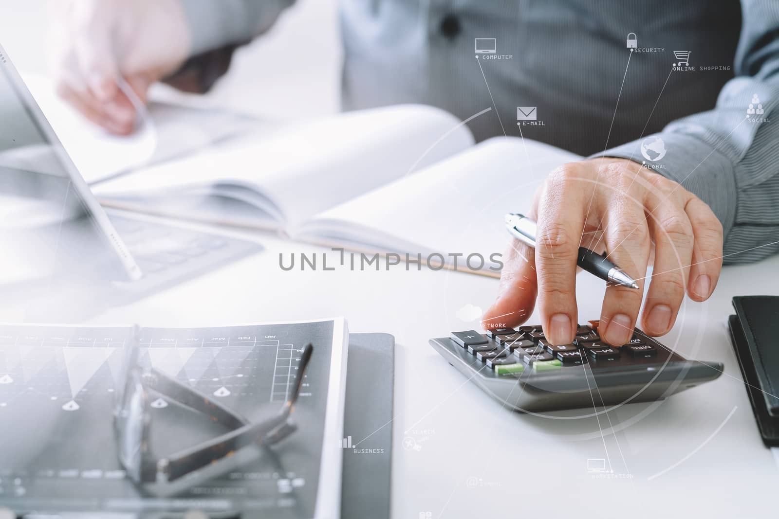 businessman hand working with finances about cost and calculator by everythingpossible