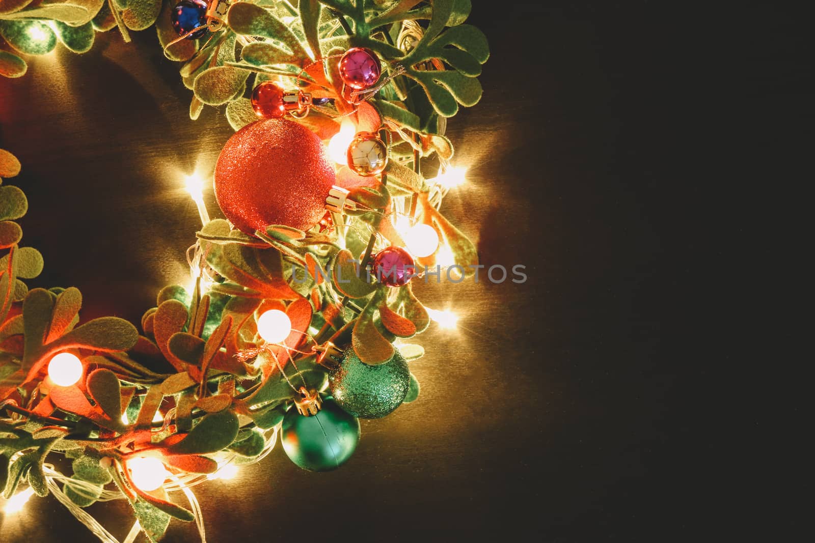 Greeting Season concept.Christmas wreath with decorative light o by everythingpossible