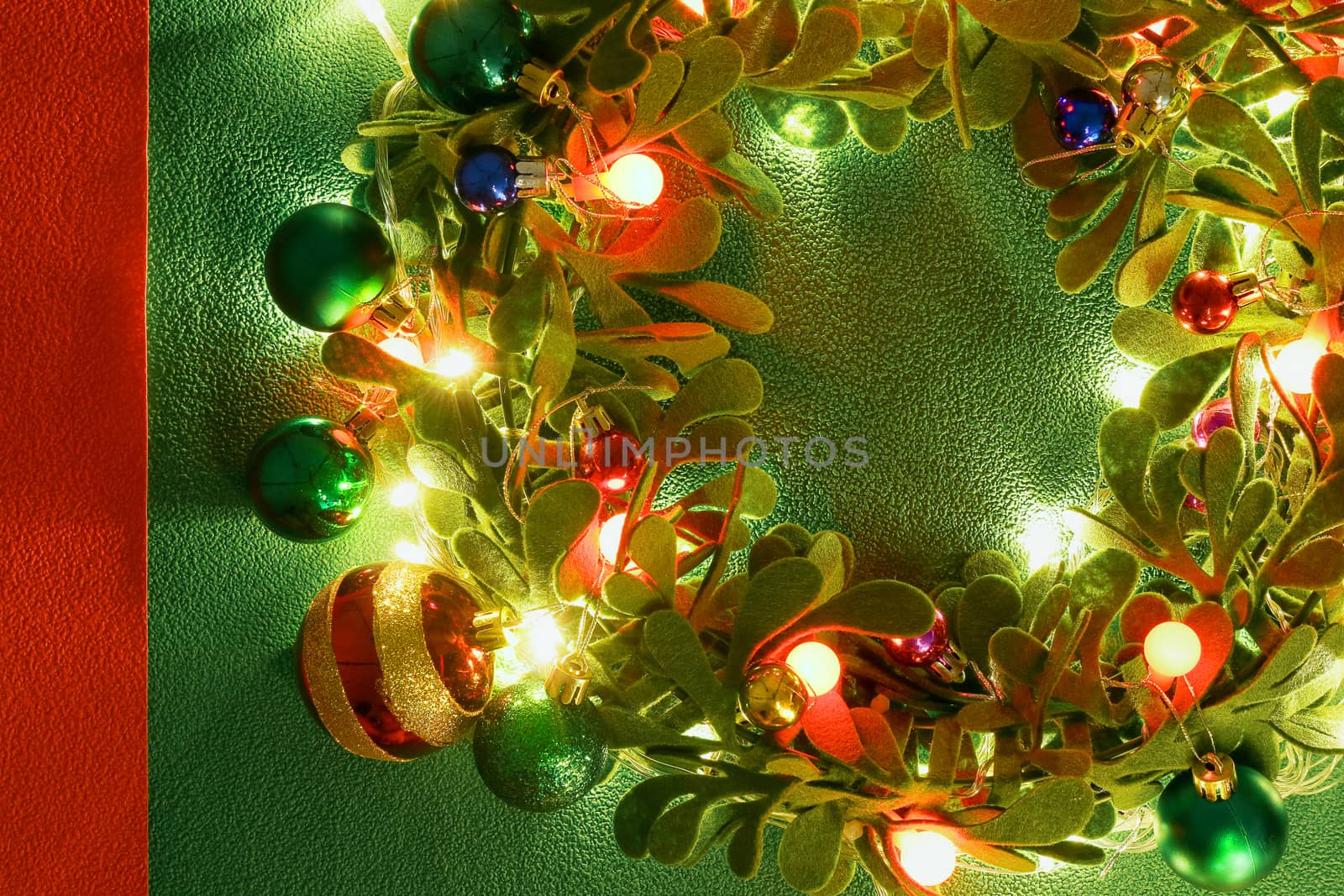 Greeting Season concept.Christmas wreath with decorative light o by everythingpossible