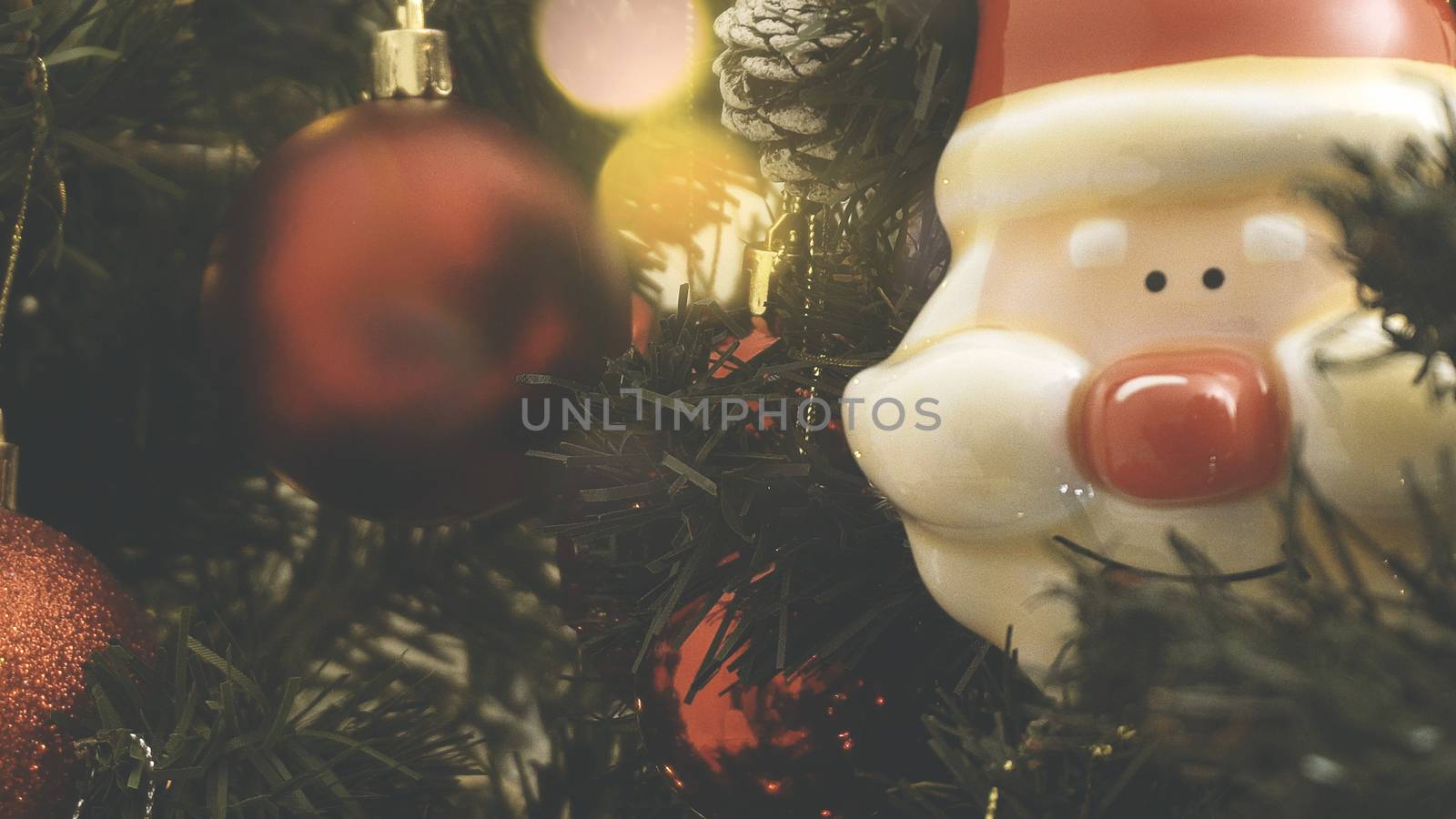 Greeting Season concept.close up of ornaments on a Christmas tre by everythingpossible