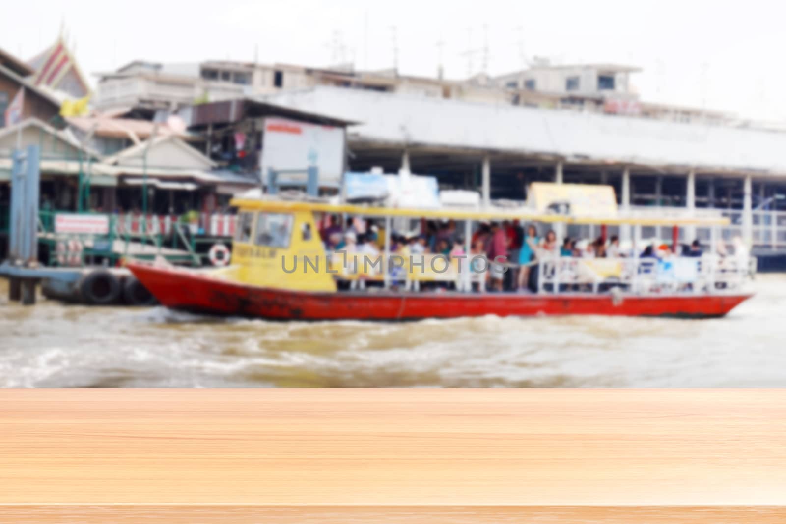 empty wood table floors on blurred passenger boat in the river background, wood table board empty front passenger boat and river, wooden plank blank on blurred boat Koh Kret, Nonthaburi, Thailand