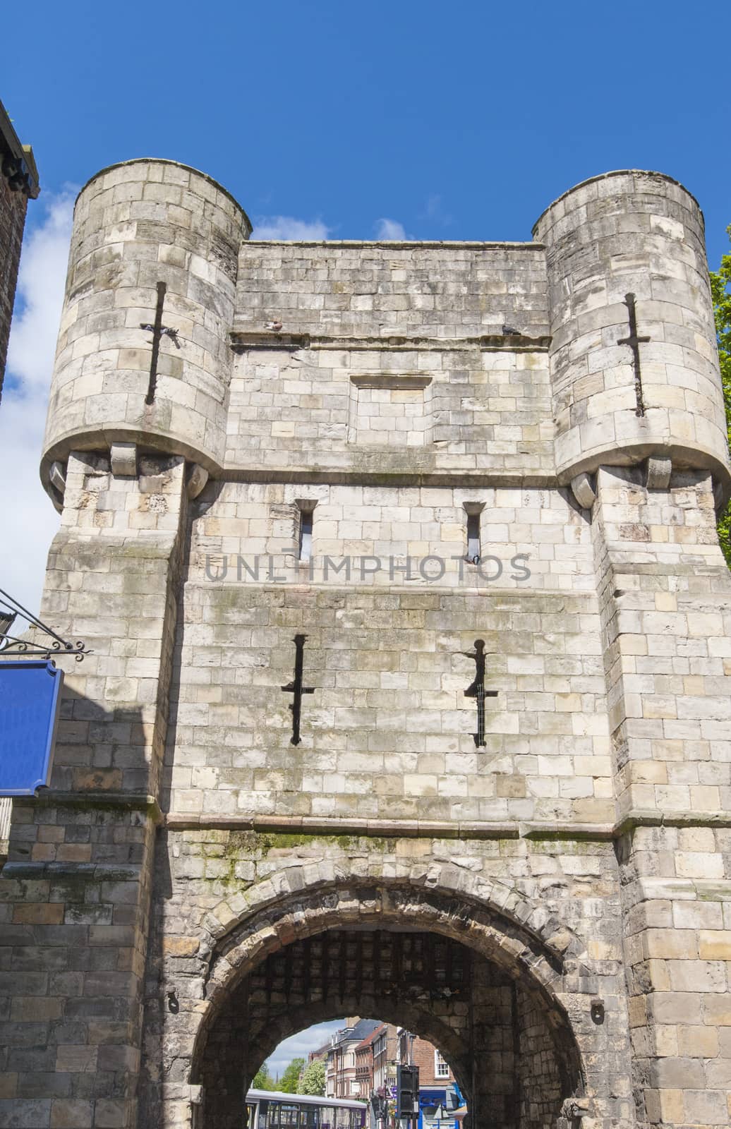 Ancient medieval gate tower tourist attraction in english city center