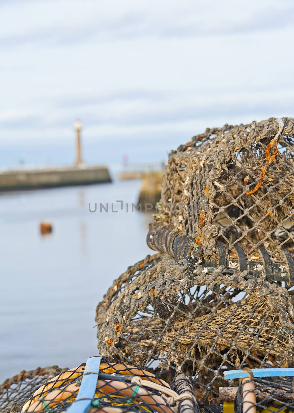 Closeup detail of lobster pots on a harbor quayside