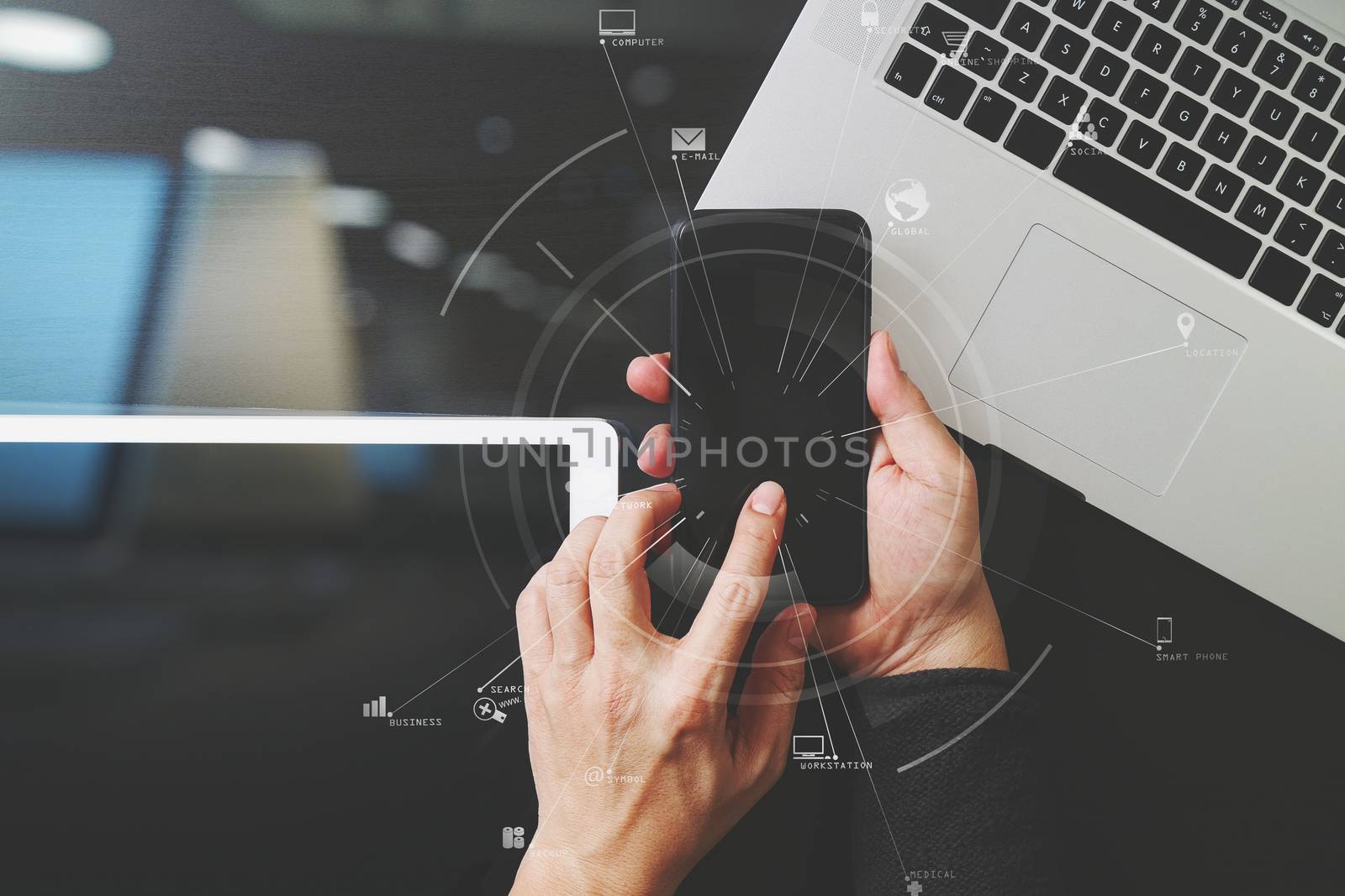 cyber security internet and networking concept.Businessman hand working with VR screen padlock icon mobile phone on laptop computer background