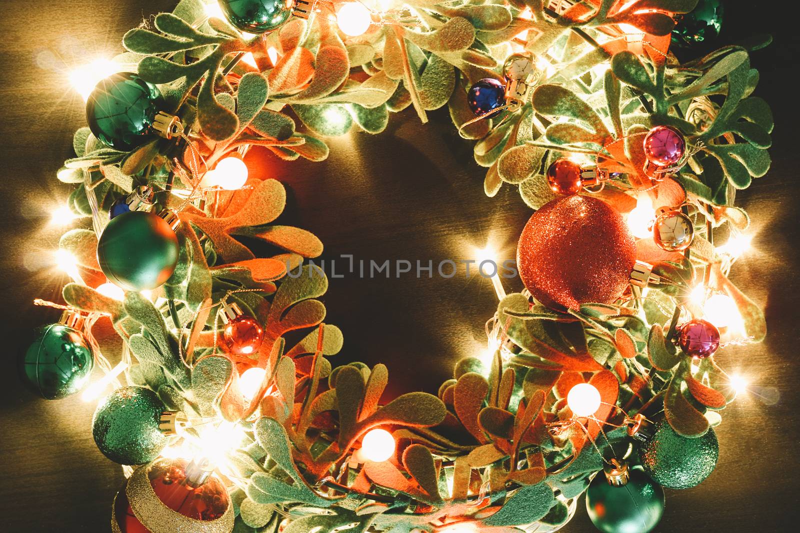 Greeting Season concept.Christmas wreath with decorative light o by everythingpossible
